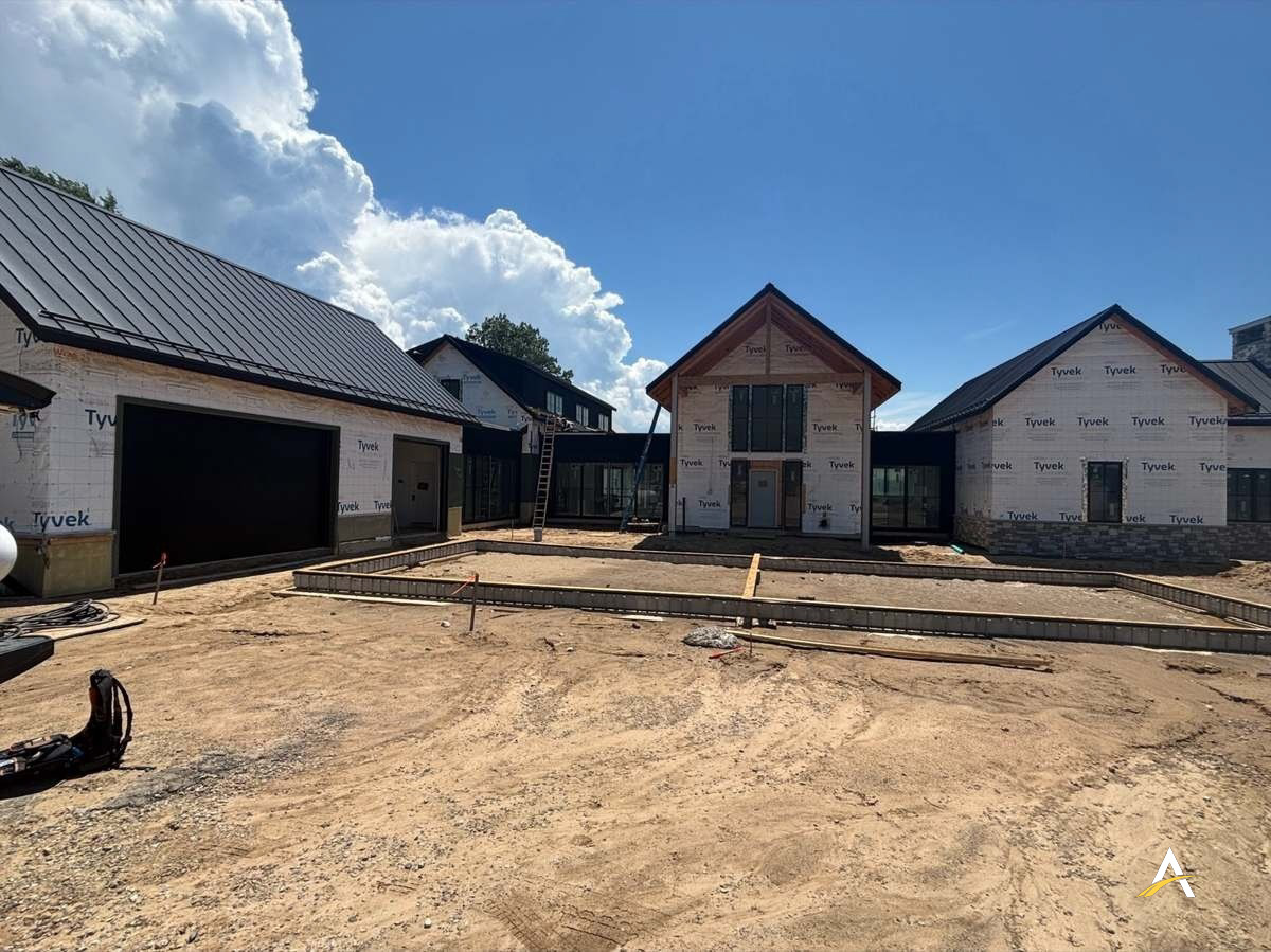 Framed courtyard with house wrap