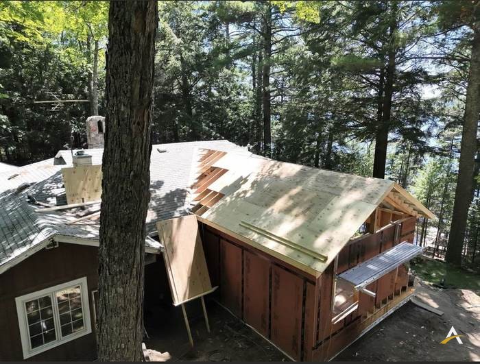 Plywood roof deck completed over the framed addition