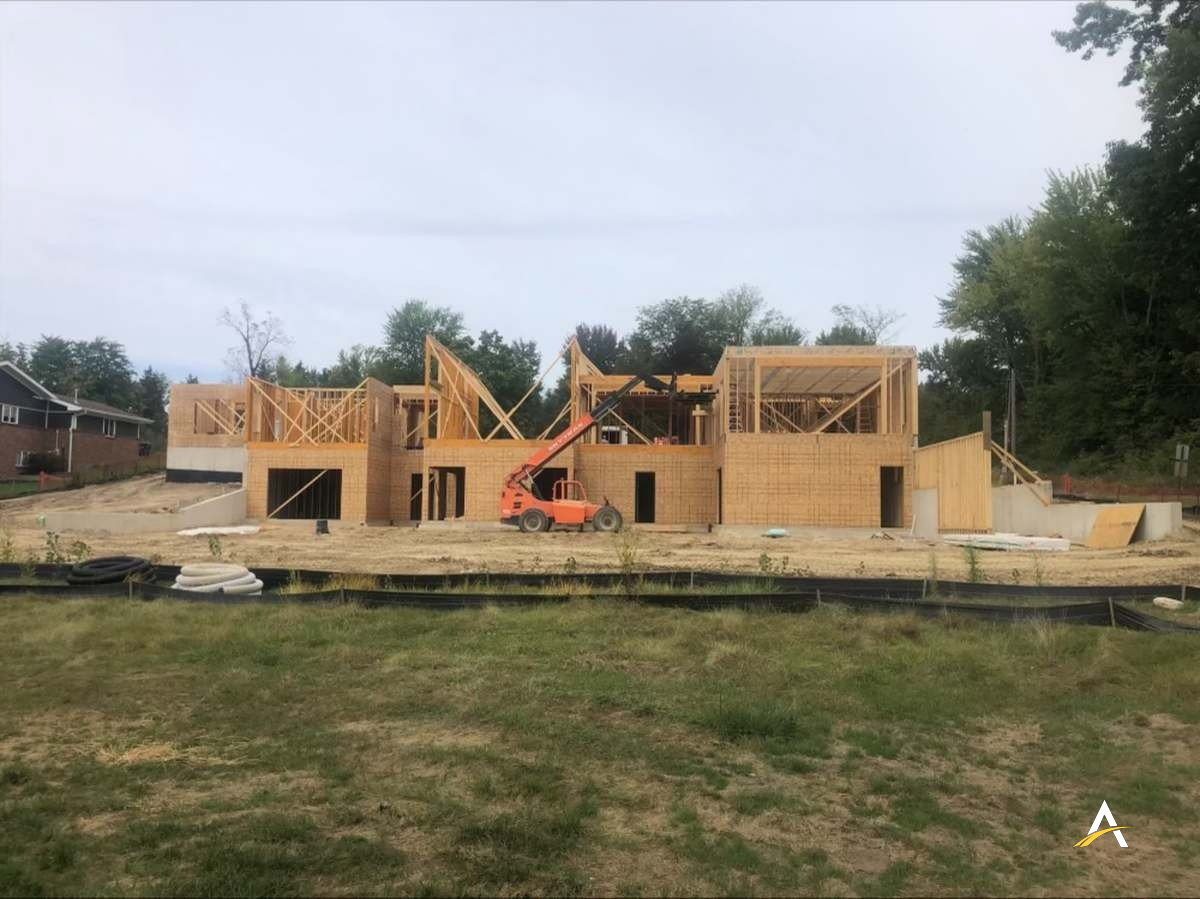 Rough framing with equipment on site
